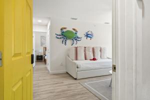 a living room with a bed and a couch at 2 Bedroom Unit in Corpus Christi
