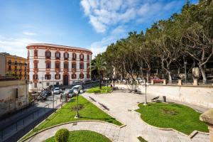 a building with a park in front of it at Al Bastione di Cagliari in Cagliari