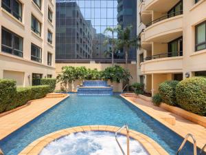 a swimming pool in the middle of a building at Mantra Parramatta in Sydney