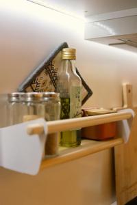 a bottle on a shelf in a refrigerator at Bravia Country House in Fafião