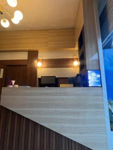 an office lobby with a large counter top at Hotel Atithi in Surkhet