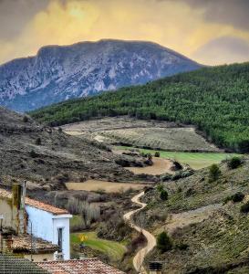 a view of a valley with a mountain in the background at Casa de la Gallega in Bargota