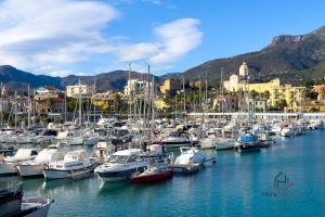 a bunch of boats docked in a harbor at Borgo castello - trekking point - 8 min Sea - AC in Loano