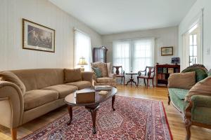 a living room with a couch and a table at The Nicholson Inn in Freeport