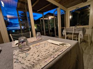 a table with a table cloth on top of a table at Il Lavandeto - farmhouse in the city in Siena