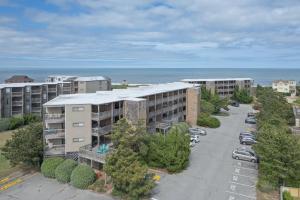 an aerial view of an apartment complex with a parking lot at 2973 - The Shack in Duck