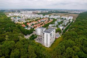 an aerial view of a city with white buildings at ClausStudio Greenfield Baneasa Therme Aeroport in Otopenii de Jos