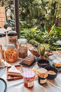 a table with many different types of food on it at OBOĒ Gardenstē in Pereybere