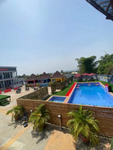 an image of a swimming pool at a resort at Bluespring luxury hotel in Elu