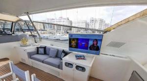 a tv sitting on the back of a boat at Private Yacht Monaco in Monte Carlo