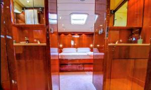 a small bathroom with a toilet and a sink at Private Yacht Monaco in Monte Carlo