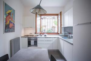 Cucina o angolo cottura di Filodrammatici Loft by Welc(H)ome