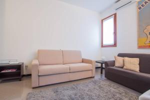 Area soggiorno di Filodrammatici Loft by Welc(H)ome