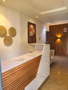 a room with a counter with a counter top at Exodus Hotel & Restaurant in Aiyetoro +1 photo