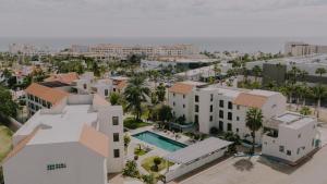 an aerial view of a city with buildings and the ocean at Santa Maria del Cabo in San José del Cabo