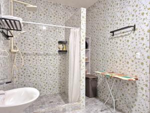 a bathroom with a shower and a sink at Endless Salt in Colchani +19 photos