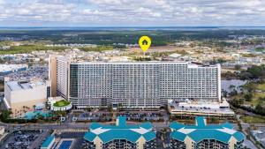 an overhead view of a hotel building with a yellow sign on it at Steps to the Sand - 1BR Condo in Panama City Beach