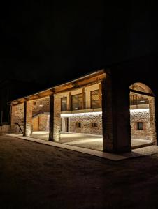 a brick building at night with lights on at B&B Cà Breganze in Breganze +28 photos