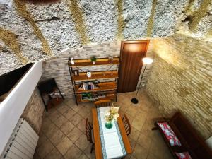 an overhead view of a room with a table and chairs at Casa Vacanze Sotto Piazza in Gualdo Tadino +14 photos