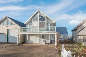 a large house with a glass roof at Waldport Beach Haven in Waldport