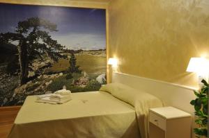 Letto o letti in una camera di I Rocchi Hotel