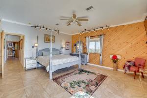 a bedroom with a bed and a ceiling fan at Private Hot Tub & Epic Views in Superstition Mtns! in Apache Junction +33 photos