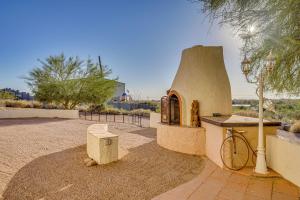 a small building with a bike next to a street light at Private Hot Tub & Epic Views in Superstition Mtns! in Apache Junction