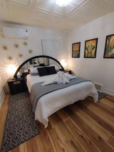 a bedroom with a large bed in a room at Deco Studio Retreat with Fireplace, WiFi, Queen Bed in Reno