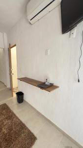 a room with a shelf on the wall at Cerro Escondido in Chiapa de Corzo +24 photos