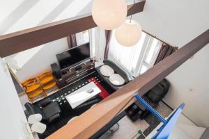an overhead view of a living room with a television at STAY IN TOYOOKA in Asahikawa