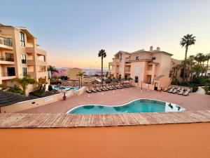 a view of a swimming pool at a resort at Terrace View - Estrela Apartment in Luz