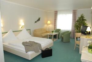 Voodi või voodid majutusasutuse Hotel Pfeffermühle toas