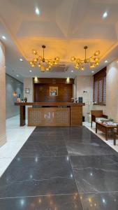 a lobby with a reception desk in a building at Nizwa Inn - نزوى إن in Nizwa +65 photos