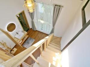an overhead view of a staircase in a living room at 拾贰小院 in Zhongyantou