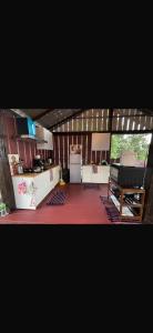 a room with a kitchen and a counter top at Mountain springs resort in Ban Nong Khieo