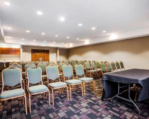 a conference room with rows of chairs and a table at Comfort Suites Independence - Kansas City in Independence