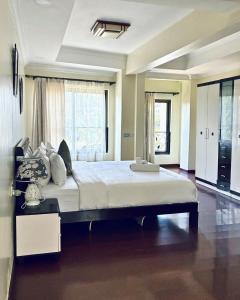a large bedroom with a large bed in a room at Eldon Hotel & Apartments in Nairobi +114 photos