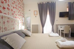 A bed or beds in a room at A Corte