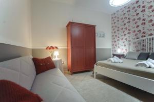 A bed or beds in a room at A Corte