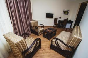 TV a/nebo společenská místnost v ubytování Hotel Lux