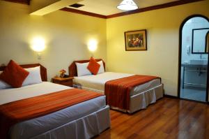 Cama ou camas em um quarto em Royal Inka II
