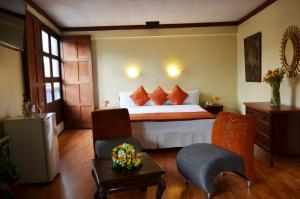 Cama ou camas em um quarto em Royal Inka II