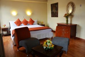 Cama ou camas em um quarto em Royal Inka II