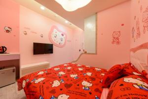 Postel nebo postele na pokoji v ubytování 安可的家 小孩及寵物免費 恆春老街夜市 屏東縣民宿0497