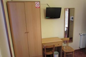 TV a/nebo společenská místnost v ubytování Hostal Prim