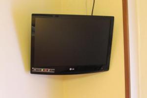 TV a/nebo společenská místnost v ubytování Hostal Prim
