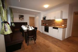 A kitchen or kitchenette at Apart welcom