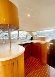 a kitchen with a counter in a boat at Yacht Experience in Monaco Harbour in Monte Carlo
