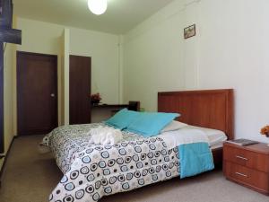 Postel nebo postele na pokoji v ubytování Hotel La Primavera