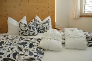 Letto o letti in una camera di Haus Kibitz
